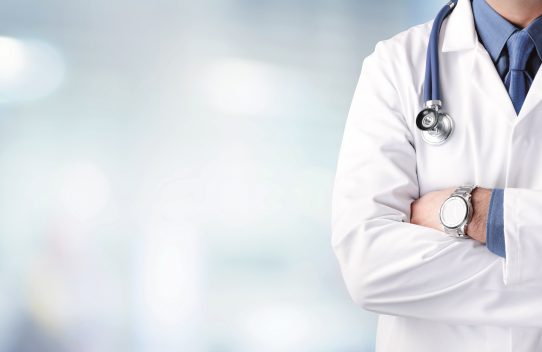 doctor man with stethoscope in hospital